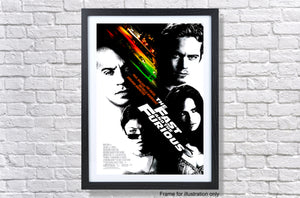 a movie poster hanging on a brick wall